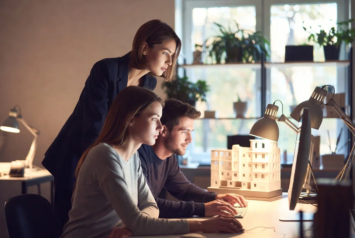 Team reviewing product on screen